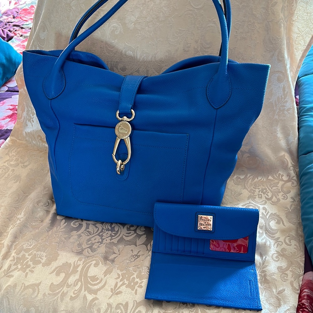 Gorgeous blue Dooney & Burke shoulder bag with matching wallet.
